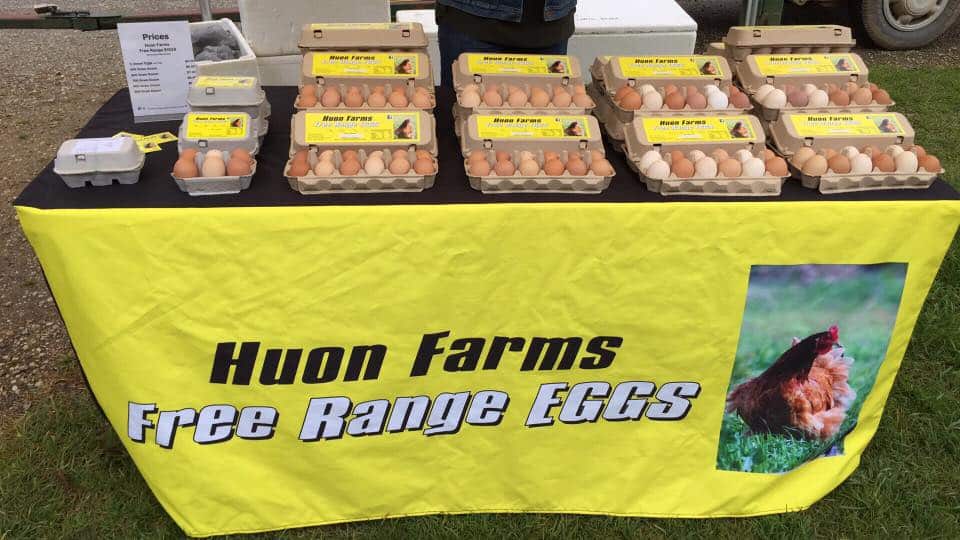 These eggs were not fertilized. This is a Photo of eggs on a table being sold at a market
