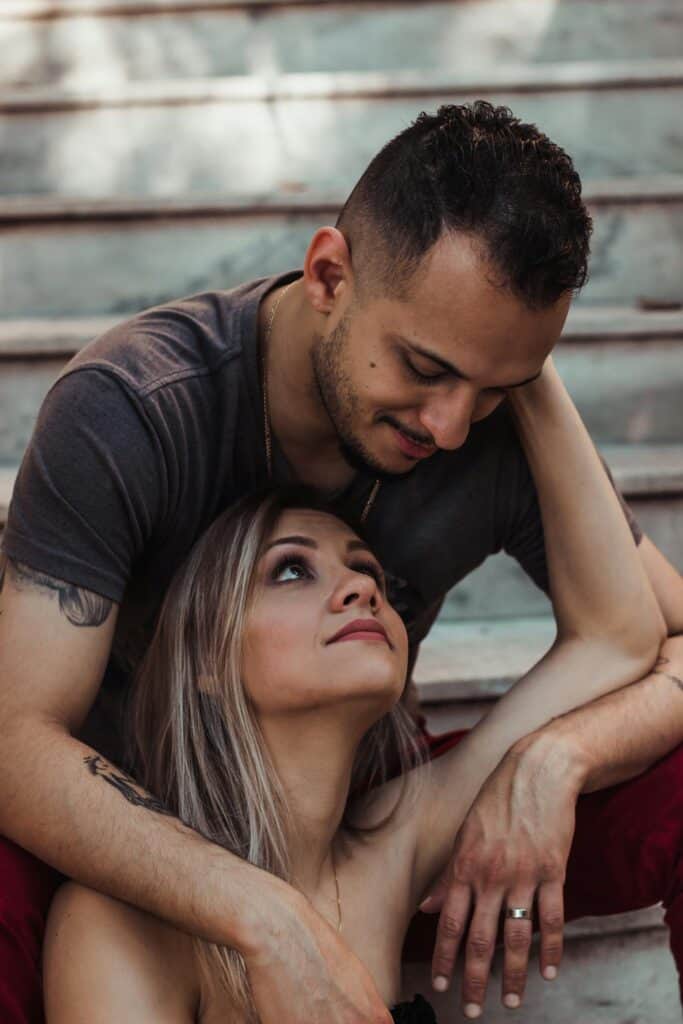 Non-verbal Cues ~ Woman Sitting in Between Man's Legs Looking Up