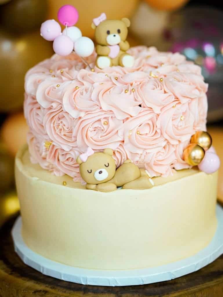 Blog Candy ~ Adorable pink bear-themed cake with rose swirls for a baby shower.